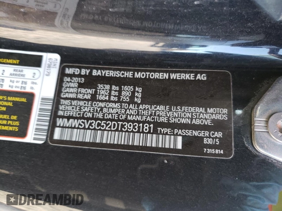 2013 MINI Hardtop S with VIN WMWSV3C52DT393181, listed as a Copart auction lot 50179065 with 66,655 mi miles and Salvage Title. Bid and sale history available at DreamBid. Image 14.