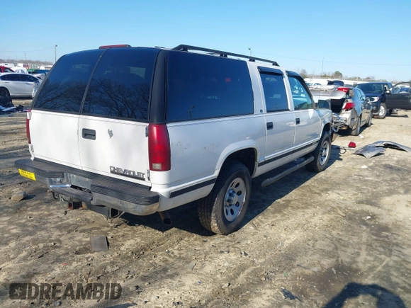 1996 Chevrolet Suburban with VIN 3GNFK16RXTG135350, listed as a IAAI auction lot 41482918 with 157,971 mi miles. Bid and sale history available at carsss.com. Image 4.
