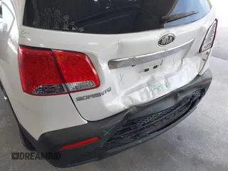 2013 Kia Sorento LX with VIN 5XYKT3A69DG370190, listed as a IAAI auction lot 42456161 with 170,196 mi miles and . Bid and sale history available at DreamBid. Image 6.