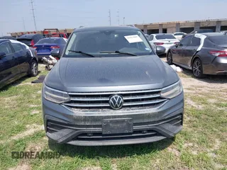 2023 Volkswagen Tiguan SE with VIN 3VVNB7AX2PM064599, listed as a IAAI auction lot 41923005 with Not provided miles and . Bid and sale history available at DreamBid. Image 12.