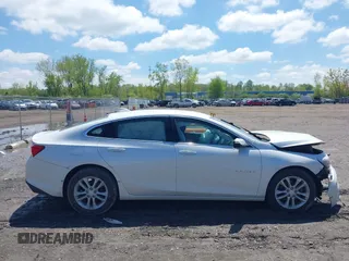 2018 Chevrolet Malibu LT z VIN 1G1ZD5ST7JF113869, wystawiony jako IAAI lot #42188467 z przebiegiem 104 531 mil mil oraz . Historia ofert i sprzedaży dostępna na DreamBid. Obrazek 13.