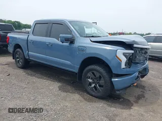 2023 Ford F-150 Lightning Pro with VIN 1FT6W1EVXPWG53591, listed as a IAAI auction lot 42249385 with 17,892 mi miles and . Bid and sale history available at DreamBid. Image 1.