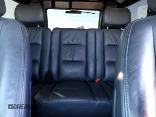 2003 Mercedes-Benz G-Class with VIN WDCYR49E23X139499, listed as a Copart auction lot 79958314 with 52,480 mi miles and Salvage Title. Bid and sale history available at carsss.com. Image 10.