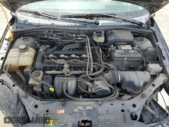2007 Ford Focus S z VIN 1FAHP34N17W103625, wystawiony jako Copart lot #55300395 z przebiegiem 82 041 mil mil oraz Szkoda całkowita • Salvage title. Historia ofert i sprzedaży dostępna na DreamBid. Obrazek 11.