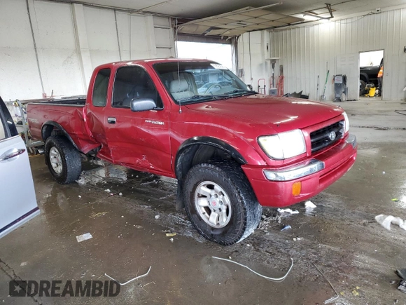 1998 Toyota Tacoma with VIN 4TAWN72NXWZ132180, listed as a Copart auction lot 65593695 with 266,993 mi miles and Salvage title. Bid and sale history available at DreamBid. Image 4.