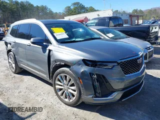 2020 Cadillac XT6 FWD Premium Luxury with VIN 1GYKPCRS3LZ137194, listed as a IAAI auction lot 41569297 with 61,966 mi miles. Bid and sale history available at carsss.com. Image 13.