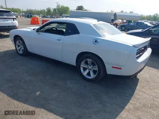 2021 Dodge Challenger SXT with VIN 2C3CDZAGXMH623245, listed as a IAAI auction lot 42007595 with 95,154 mi miles. Bid and sale history available at carsss.com. Image 3.