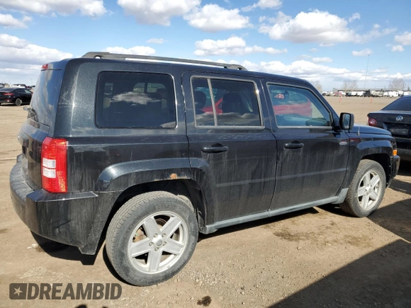 2010 Jeep Patriot Sport with VIN 1J4NF2GB8AD519311, listed as a Copart auction lot 53799085 with 203,762 mi miles and Salvage Title. Bid and sale history available at carsss.com. Image 3.
