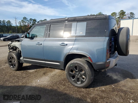 2023 Land Rover Defender SE with VIN SALEPEEU8P2115950, listed as a Copart auction lot 82717694 with 18,246 mi miles and Salvage title. Bid and sale history available at DreamBid. Image 2.