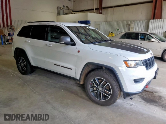 2018 Jeep Grand Cherokee Trailhawk with VIN 1C4RJFLG7JC393897, listed as a Copart auction lot 61683145 with 234,453 mi miles and Clean title. Bid and sale history available at DreamBid. Image 4.