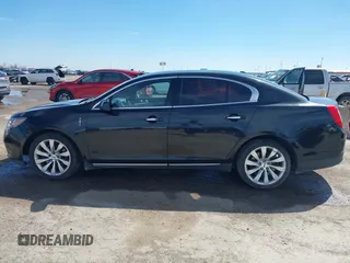 2014 Lincoln MKS with VIN 1LNHL9DK1EG604323, listed as a IAAI auction lot 41635817 with 223,136 mi miles. Bid and sale history available at carsss.com. Image 14.