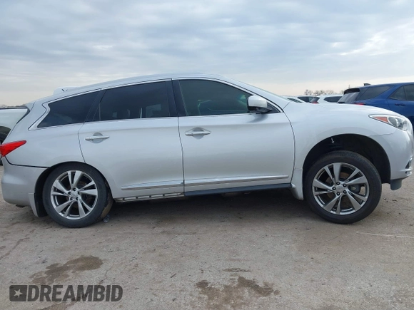 2013 Infiniti JX35 with VIN 5N1AL0MM8DC352896, listed as a IAAI auction lot 41561639 with 158,533 mi miles and . Bid and sale history available at DreamBid. Image 14.