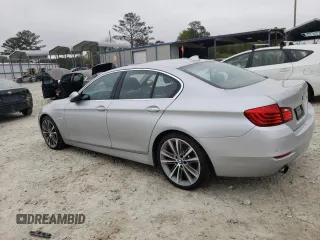2015 BMW 5 Series 535i with VIN WBA5B1C53FD921981, listed as a Copart auction lot 48983675 with 100,397 mi miles and Salvage Title. Bid and sale history available at carsss.com. Image 2.