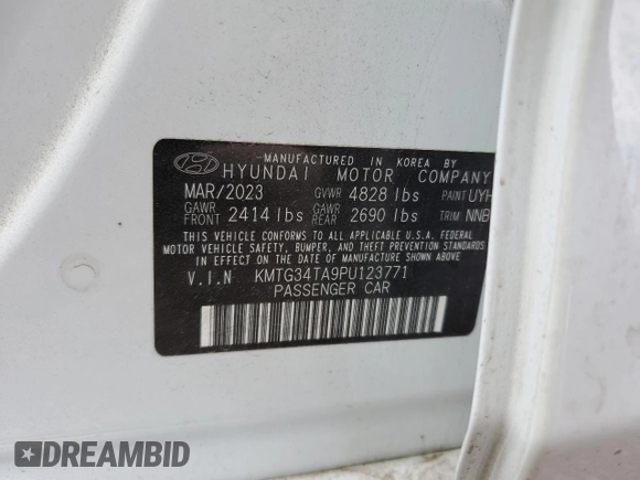 2023 Genesis G70 2.0T with VIN KMTG34TA9PU123771, listed as a Copart auction lot 62946065 with 43,171 mi miles and Salvage title. Bid and sale history available at DreamBid. Image 12.