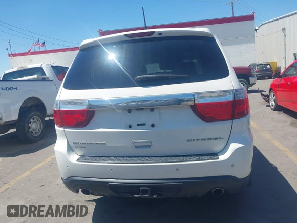 2012 Dodge Durango Citadel with VIN 1C4SDJET0CC100625, listed as a IAAI auction lot 42170821 with 130,866 mi miles and . Bid and sale history available at DreamBid. Image 16.