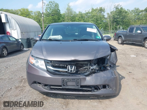2014 Honda Odyssey EX-L with VIN 5FNRL5H6XEB121390, listed as a IAAI auction lot 42480217 with 291,766 mi miles and . Bid and sale history available at DreamBid. Image 12.