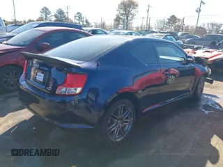 2013 Scion tC with VIN JTKJF5C76D3054733, listed as a IAAI auction lot 40998576 with 155,540 mi miles. Bid and sale history available at carsss.com. Image 4.