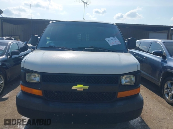 2014 Chevrolet Express Cargo Van with VIN 1GCWGFCG0E1100859, listed as a IAAI auction lot 42142748 with 182,900 mi miles. Bid and sale history available at carsss.com. Image 12.
