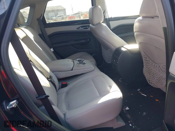 2016 Cadillac SRX Luxury Collection z VIN 3GYFNBE38GS585949, wystawiony jako IAAI lot #41413583 z przebiegiem 98 201 mil mil oraz . Historia ofert i sprzedaży dostępna na DreamBid. Obrazek 8.
