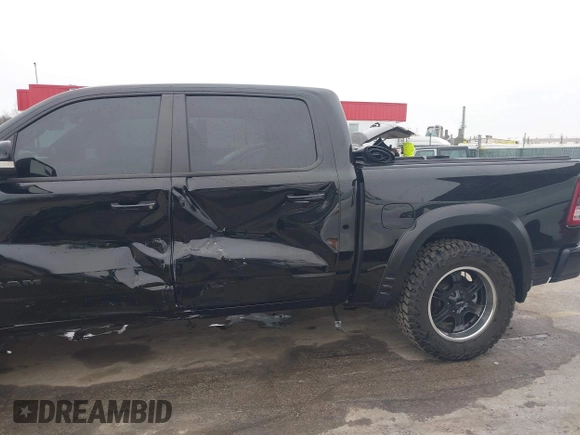 2022 Ram 1500 Big Horn with VIN 1C6SRFFT3NN287385, listed as a IAAI auction lot 41793596 with 12,277 mi miles and . Bid and sale history available at DreamBid. Image 18.