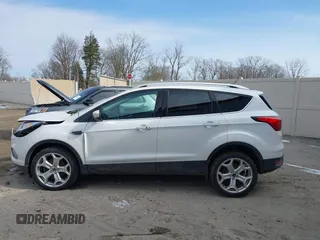 2019 Ford Escape Titanium with VIN 1FMCU9J97KUB85528, listed as a IAAI auction lot 41708344 with 88,841 mi miles. Bid and sale history available at carsss.com. Image 14.