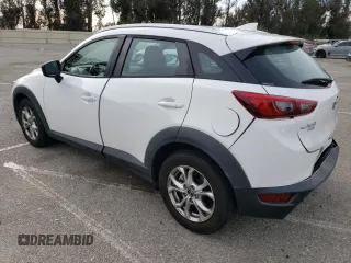 2016 Mazda CX-3 Touring with VIN JM1DKBC71G0123543, listed as a Copart auction lot 84657294 with 113,080 mi miles and Salvage Title. Bid and sale history available at carsss.com. Image 2.