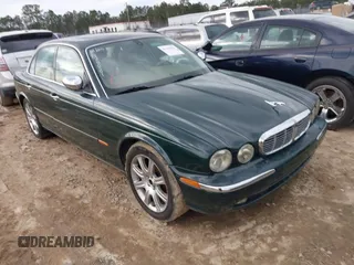 2004 Jaguar XJ Vanden Plas with VIN SAJWA74C34SG28881, listed as a IAAI auction lot 41439042 with 171,502 mi miles and . Bid and sale history available at DreamBid. Image 1.