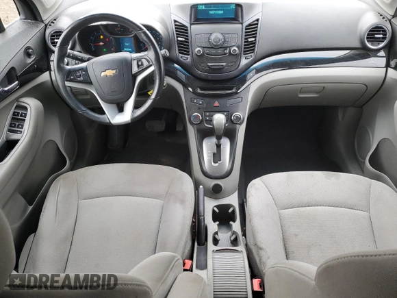 2012 Chevrolet Orlando 1LT z VIN KL77P2EM1CK550055, wystawiony jako Copart lot #77021754 z przebiegiem 127 987 mil mil oraz Szkoda całkowita • Salvage title. Historia ofert i sprzedaży dostępna na DreamBid. Obrazek 8.