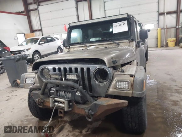 2005 Jeep Wrangler Rubicon with VIN 1J4FA69S65P311732, listed as a IAAI auction lot 41442147 with 174,277 mi miles. Bid and sale history available at carsss.com. Image 12.