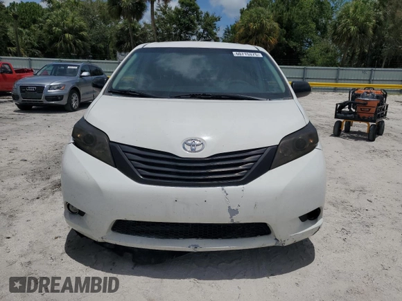 2014 Toyota Sienna L with VIN 5TDZK3DC3ES430634, listed as a Copart auction lot 60715375 with 122,621 mi miles and Salvage title. Bid and sale history available at DreamBid. Image 5.