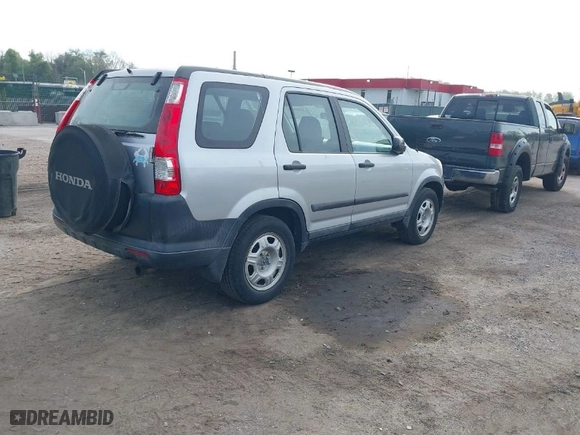 2005 Honda CR-V LX with VIN SHSRD78595U321847, listed as a IAAI auction lot 42099841 with 212,423 mi miles. Bid and sale history available at carsss.com. Image 4.