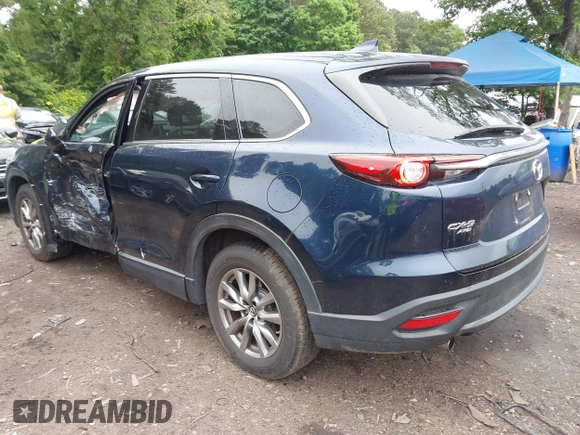 2019 Mazda CX-9 Touring with VIN JM3TCBCY6K0334898, listed as a IAAI auction lot 42467677 with 69,454 mi miles and . Bid and sale history available at DreamBid. Image 3.