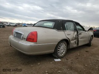 2004 Lincoln Town Car Signature with VIN 1LNHM81WX4Y606532, listed as a Copart auction lot 49666775 with 47,509 mi miles and Salvage Title. Bid and sale history available at carsss.com. Image 3.