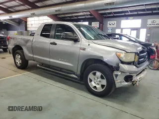 2010 Toyota Tundra 4WD Truck with VIN 5TFUY5F14AX138690, listed as a Copart auction lot 70699574 with 207,326 mi miles and Clean Title. Bid and sale history available at carsss.com. Image 4.