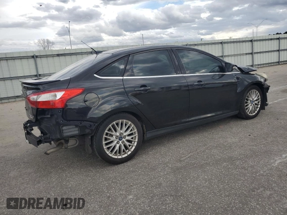 2014 Ford Focus Titanium with VIN 1FADP3J22EL221898, listed as a Copart auction lot 47867325 with 97,806 mi miles and Salvage Title. Bid and sale history available at DreamBid. Image 3.