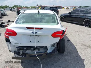 2018 Ford Focus SE with VIN 1FADP3F29JL213008, listed as a IAAI auction lot 41790224 with 85,056 mi miles and . Bid and sale history available at DreamBid. Image 6.