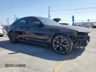 2021 BMW 5 Series 540i with VIN WBA53BJ05MWW92487, listed as a Copart auction lot 57679975 with 53,311 mi miles and Salvage title. Bid and sale history available at DreamBid. Image 4.