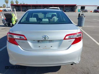 2014 Toyota Camry L with VIN 4T4BF1FK5ER442960, listed as a IAAI auction lot 42206639 with 119,639 mi miles and . Bid and sale history available at DreamBid. Image 16.