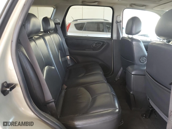2003 Mazda Tribute ES with VIN 4F2CZ96113KM50336, listed as a Copart auction lot 73338334 with 102,678 mi miles and Salvage Title. Bid and sale history available at carsss.com. Image 11.