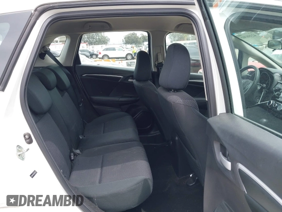 2020 Honda Fit LX with VIN 3HGGK5H44LM718313, listed as a IAAI auction lot 42358302 with 63,964 mi miles and . Bid and sale history available at DreamBid. Image 8.