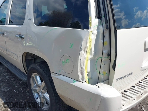 2013 Chevrolet Tahoe LTZ with VIN 1GNSKCE07DR326996, listed as a IAAI auction lot 42203073 with 147,067 mi miles and . Bid and sale history available at DreamBid. Image 6.