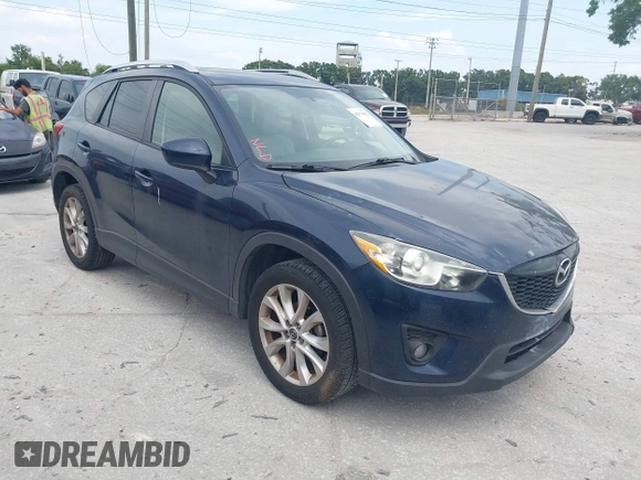 2014 Mazda CX-5 Grand Touring with VIN JM3KE2DY8E0425258, listed as a IAAI auction lot 42179452 with 132,137 mi miles. Bid and sale history available at carsss.com. Image 1.