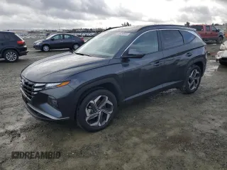 2023 Hyundai Tucson SEL z VIN 5NMJFCAE2PH220698, wystawiony jako Copart lot #49456995 z przebiegiem 14 136 mil mil oraz Szkoda całkowita • Salvage title. Historia ofert i sprzedaży dostępna na DreamBid. Obrazek 1.