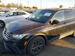 2022 Volkswagen Tiguan SE with VIN 3VV3B7AX1NM083939, listed as a IAAI auction lot 41158579 with 77,111 mi miles. Bid and sale history available at carsss.com. Image 6.