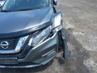 2017 Nissan Rogue SV with VIN KNMAT2MV6HP540419, listed as a IAAI auction lot 42280185 with 112,305 mi miles and . Bid and sale history available at DreamBid. Image 20.