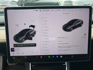 2018 Tesla Model 3 Long Range Battery with VIN 5YJ3E1EA7JF012249, listed as a IAAI auction lot 41782972 with 103,412 mi miles. Bid and sale history available at carsss.com. Image 17.