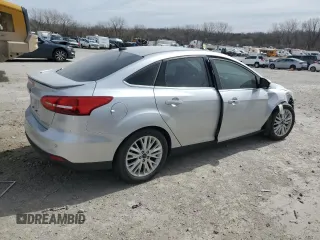 2017 Ford Focus Titanium with VIN 1FADP3J23HL347739, listed as a Copart auction lot 49385365 with 79,484 mi miles and Salvage title. Bid and sale history available at DreamBid. Image 3.