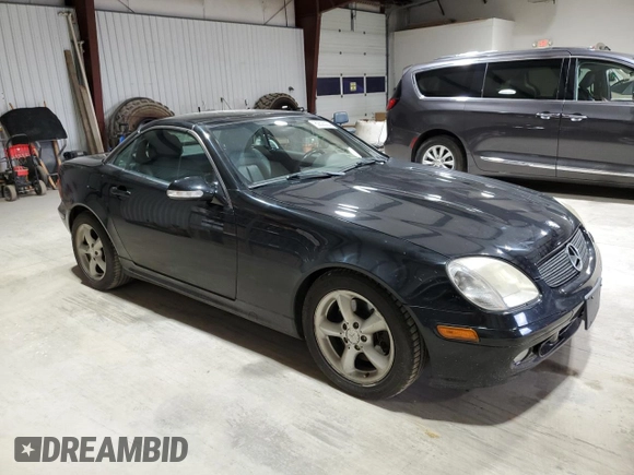 2003 Mercedes-Benz SLK 320 with VIN WDBKK65F23F277574, listed as a Copart auction lot 82523004 with 112,143 mi miles and Clean title. Bid and sale history available at DreamBid. Image 4.