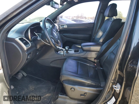 2014 Jeep Grand Cherokee Laredo with VIN 1C4RJFAG4EC210321, listed as a Copart auction lot 53574595 with 119,650 mi miles and Salvage Title. Bid and sale history available at DreamBid. Image 7.