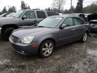 2007 Kia Optima EX with VIN KNAGE124375134243, listed as a Copart auction lot 86664454 with 136,700 mi miles and Salvage Title. Bid and sale history available at carsss.com. Image 1.